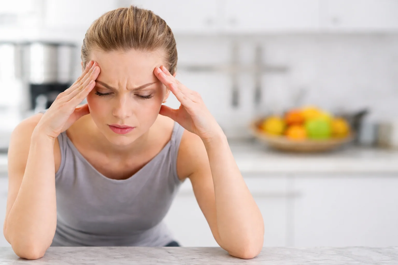 Woman showing stress and anxiety, representing oxidative stress symptoms
